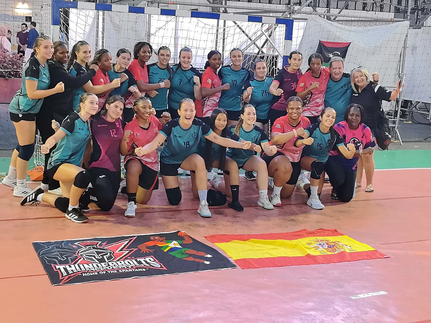 Thunderbolts players with an international women's handball team
